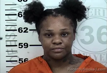 Mugshot of Arnasia Shanice Holmes booked in Lafayette County, Mississippi on August 13, 2026