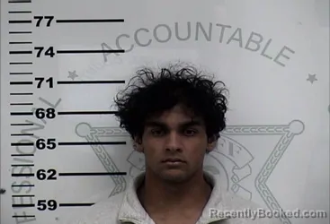 Mugshot of Kris Minish Patel booked in Lafayette County, Mississippi on October 22, 2026