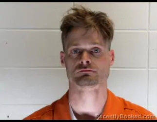 Mugshot of JONATHAN PAUL SHUMAKER