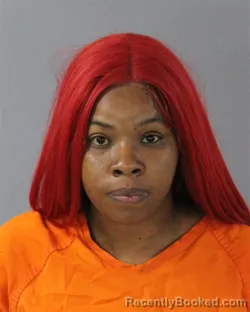 Mugshot of Alicia Lacole Moore booked in Madison County, Mississippi on August 22, 2026