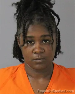 Mugshot of NAUTICAH QUESHIA NASHUN REED booked in Madison County, Mississippi on May 30, 2026