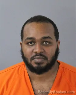 Mugshot of JUSTIN ARTEVIUS EVANS booked in Madison County, Mississippi on May 7, 2026