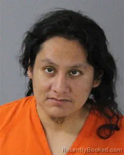 Mugshot of DANTA NITA OSSI COTTON booked in Madison County, Mississippi on March 13, 2026