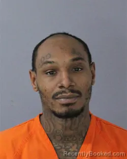 Mugshot of CORNELIUS JAMAL TATE