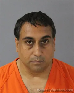 Mugshot of RUPINDER SINGH REKHI booked in Madison County, Mississippi on July 14, 2026