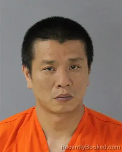 Mugshot of ZHONG HUI HUANG booked in Madison County, Mississippi on May 26, 2026