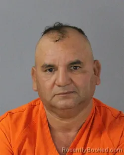 Mugshot of JESUS AGUILAR MENJIVAR booked in Madison County, Mississippi on July 12, 2026