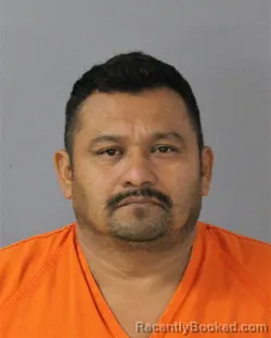 Mugshot of JESUS REYES-ROLON booked in Madison County, Mississippi on July 14, 2026