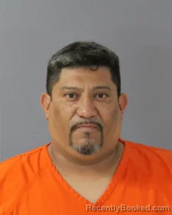 Mugshot of MARCOS ESPANA-GARCIA booked in Madison County, Mississippi on July 30, 2026