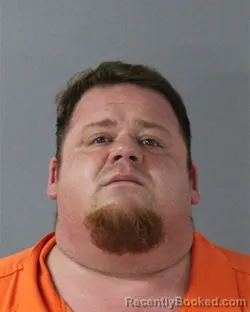 Mugshot of Joshua Lee Collins booked in Madison County, Mississippi on August 13, 2026