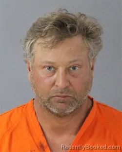 Mugshot of Daniel Scott Dinkelacker booked in Madison County, Mississippi on September 8, 2026