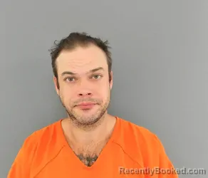 Mugshot of AARON THOMAS
