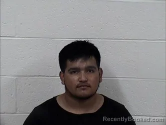 Mugshot of Johnny Espana booked in Panola County, Mississippi on August 26, 2026