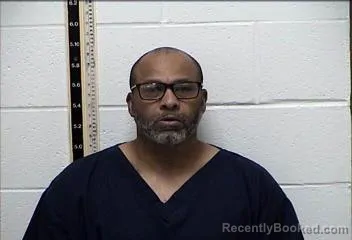 Mugshot of NORBERT HENRY