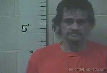 Mugshot of RICHARD G EVANS