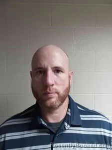 Mugshot of RYAN L CLAYCOMB