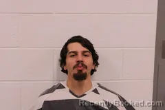 Mugshot of Garrett Q Couey