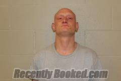 Booking photo from Benton County, Missouri