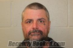 Booking photo from Benton County, Missouri