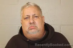 Booking photo from Benton County, Missouri