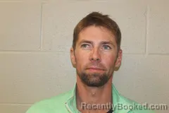 Mugshot of Kurtis Garr booked in Benton County, Missouri on October 6, 2026