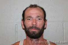 Mugshot of DAN SLATER booked in Benton County, Missouri on June 17, 2026