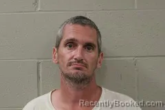 Mugshot of DUSTIN HAYES booked in Benton County, Missouri on July 4, 2026