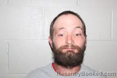 Mugshot of Justin Oliver booked in Benton County, Missouri on October 18, 2026