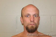 Mugshot of Adam Johnson booked in Benton County, Missouri on October 22, 2026
