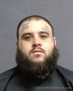 Mugshot of NATHAN STARCHER booked in Glades County, Florida on April 17, 2026