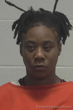 Mugshot of REGINA SHERITA BENTON booked in Wayne County, North Carolina on March 19, 2026