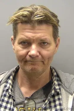 Mugshot of JUSTIN WADE JUNGERT