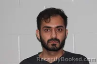 Mugshot of AMAN KUMAR booked in Caldwell County, Missouri on May 8, 2026