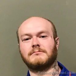 Mugshot of Nathan Ezra- Alexander Downing booked in Wilkes County, North Carolina on August 21, 2026