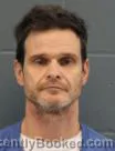 Mugshot of ANDREW NICHOLAS SVAGLIC booked in Cass County, Missouri on May 18, 2026
