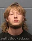 Mugshot of Cameron Cluren Dover booked in Cass County, Missouri on October 5, 2026