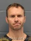 Mugshot of CURTIS GEORGE SCHROEGER booked in Cass County, Missouri on May 21, 2026
