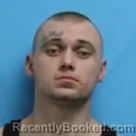 Mugshot of CHRISTIAN LEE SWITZER booked in Cass County, Missouri on March 19, 2026