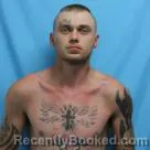 Mugshot of CHRISTIAN LEE SWITZER booked in Cass County, Missouri on April 27, 2026