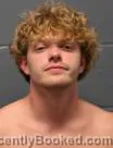 Mugshot of ETHAN MICHAEL DAMRON booked in Cass County, Missouri on June 20, 2026