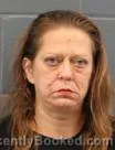 Mugshot of HOLLY ANN SCHWARK booked in Cass County, Missouri on May 12, 2026