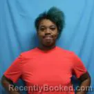 Mugshot of JAEMISHA DASHAY COLLINS booked in Cass County, Missouri on June 14, 2026