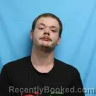 Mugshot of JOHNNIE DON JAEDEN ELLIOTT booked in Cass County, Missouri on March 31, 2026