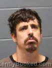 Mugshot of JUSTIN STEVEN PATMORE booked in Cass County, Missouri on July 13, 2026