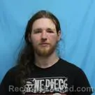 Mugshot of LOGAN NATHANAEL MINICKS booked in Cass County, Missouri on April 23, 2026