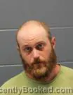 Mugshot of TAYLOR ADAM BROWN booked in Cass County, Missouri on July 14, 2026