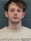 Mugshot of TANNER MICHAEL CHAPMAN booked in Cass County, Missouri on August 2, 2026