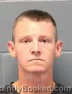 Mugshot of Travis Allen Menefee booked in Cass County, Missouri on September 10, 2026