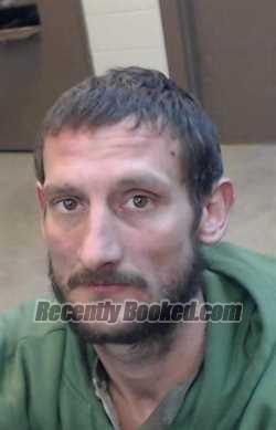 Booking photo from Cedar County, Missouri