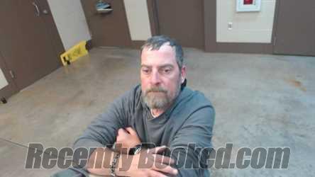 Booking photo from Cedar County, Missouri